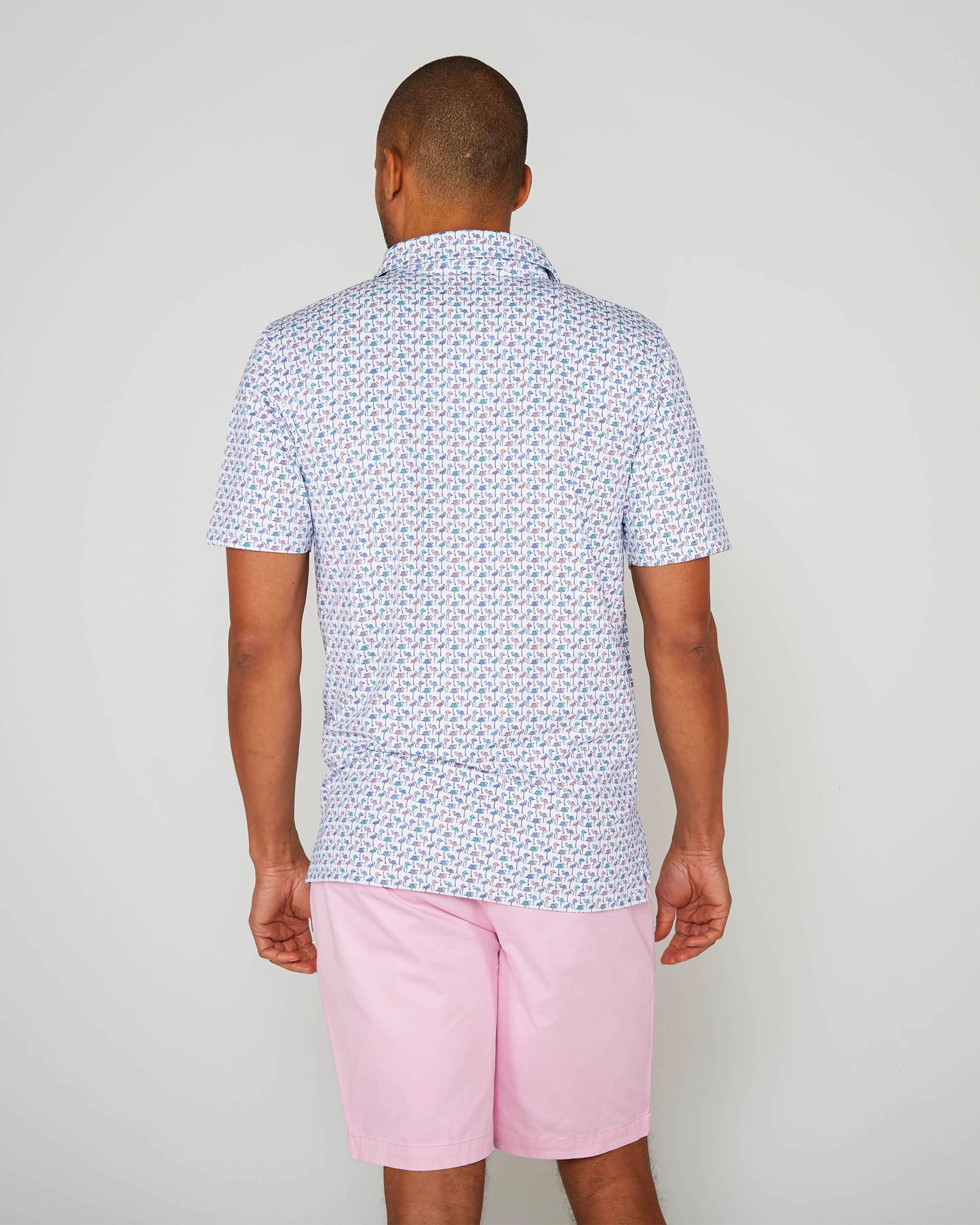 GOLF POLO IN PERFORMANCE POLO FLAMINGO WHITE